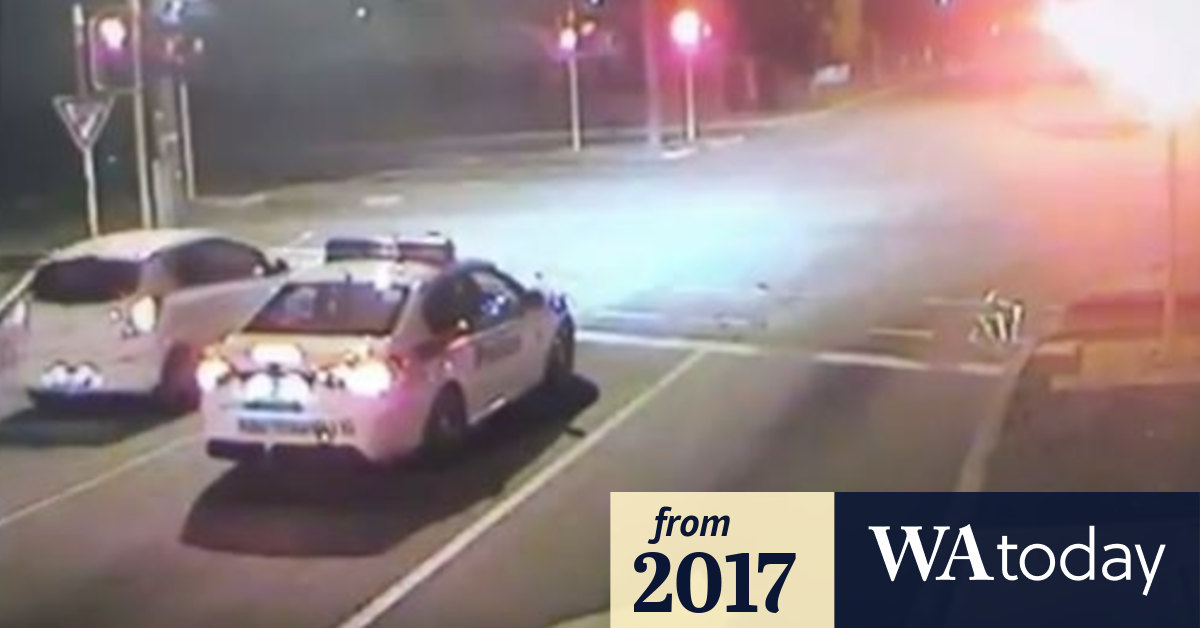How stupid can you get? Car drives through red light right in front of